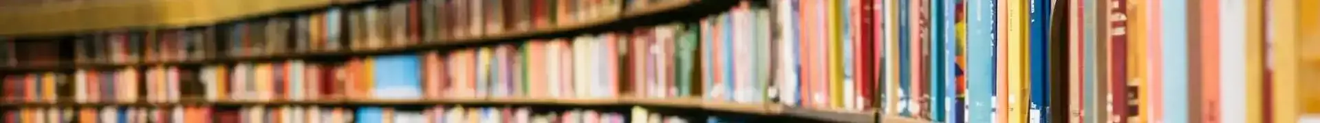 Background image of colorful books on curved shelves, symbolizing reading and writing.